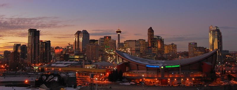 Skyline of Calgary, Alberta, showing the Saddledome, home to the NHL’s Calgary Flames. Kombi winter mitts.
